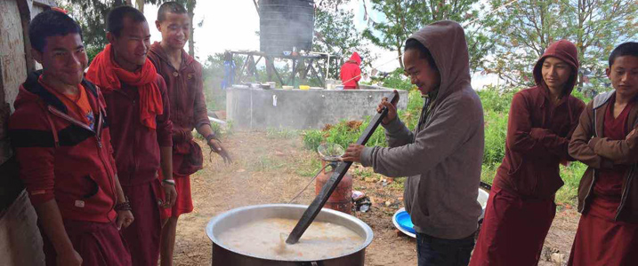 Ösel Ling monks distributing food to local earthquake victims. Source: Tergar Ösel Ling